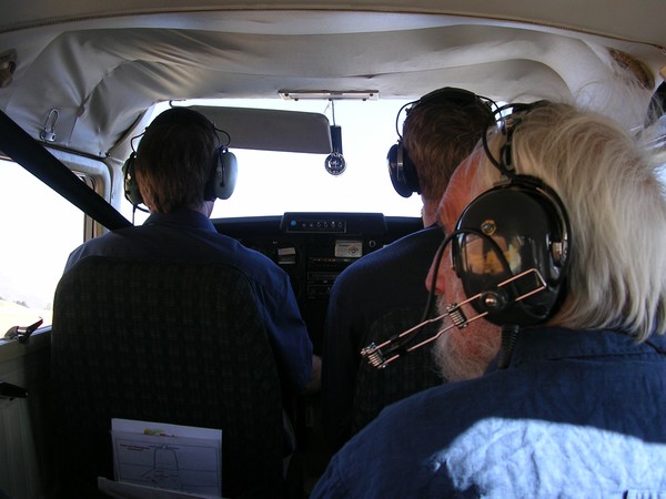 Glacier end of summer snowline survey in action. Dr Trevor Chinn sits behind pilot (Andy Woods) and Andrew Willsman from NIWA. 